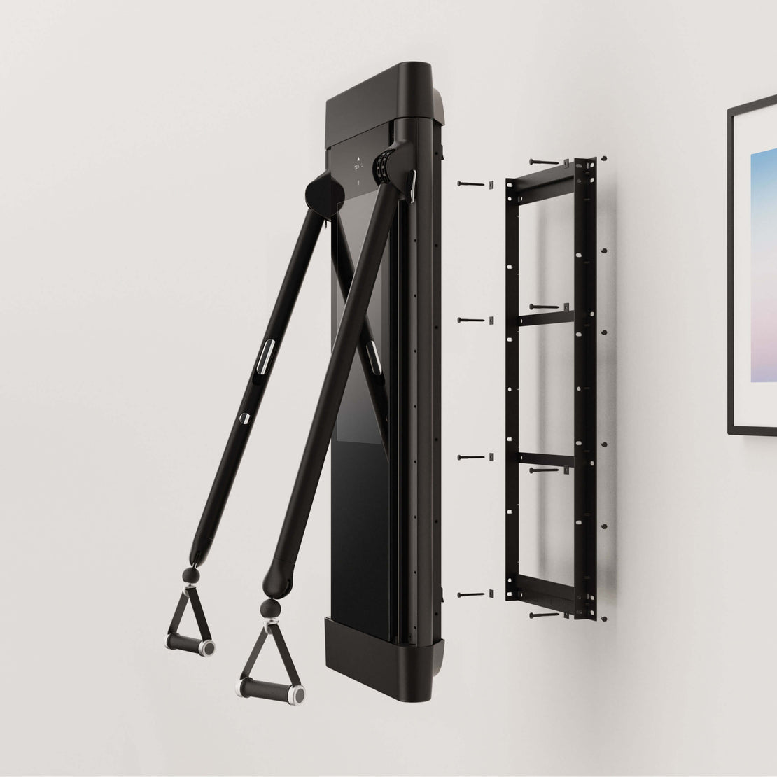 A Tonal machine and its wall-mounting hardware.